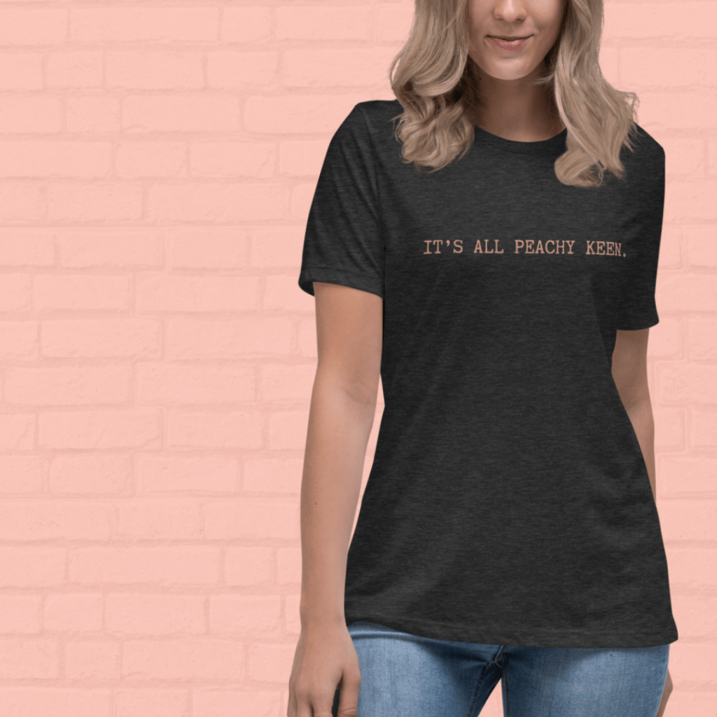 t-shirt that says "it's all peachy keen"